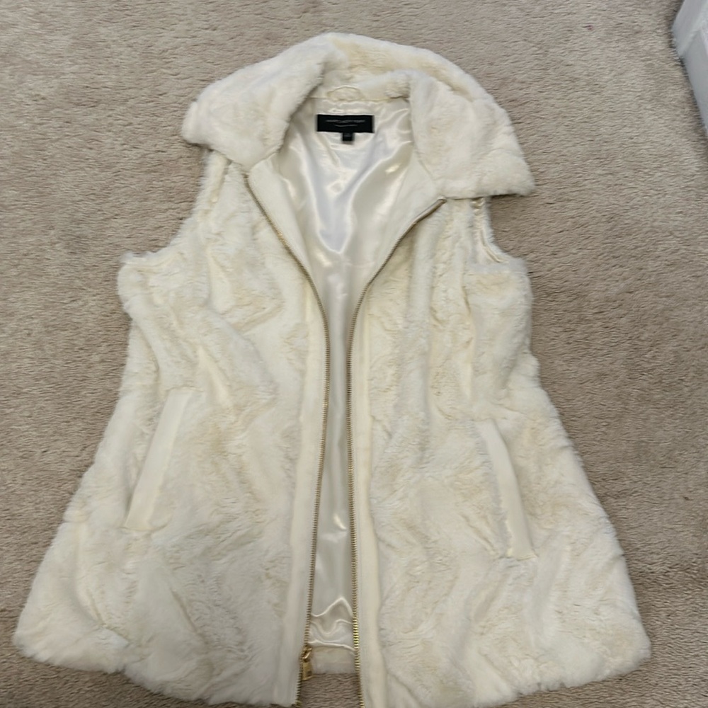 White fluffy vest